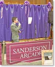 Tom Wyllie sings to open Curiously Wicked, Sanderson Arcade, Morpeth